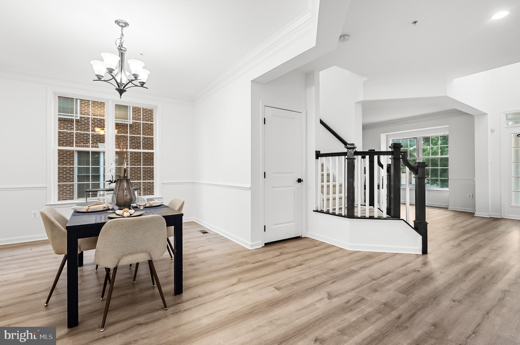4603 Thoroughbred Drive Upper Marlboro, MD 20772 - Photo 13 of 64 a view of a dining room with furniture window and wooden floor