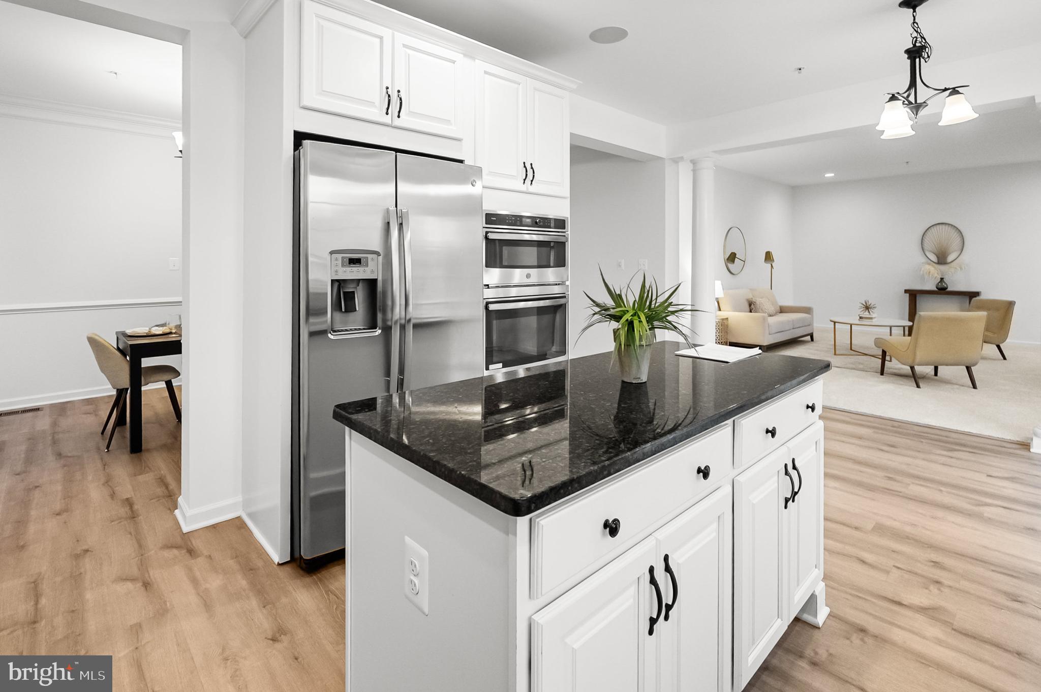 4603 Thoroughbred Drive Upper Marlboro, MD 20772 - Photo 18 of 64 a kitchen with stainless steel appliances granite countertop a sink a stove and a refrigerator