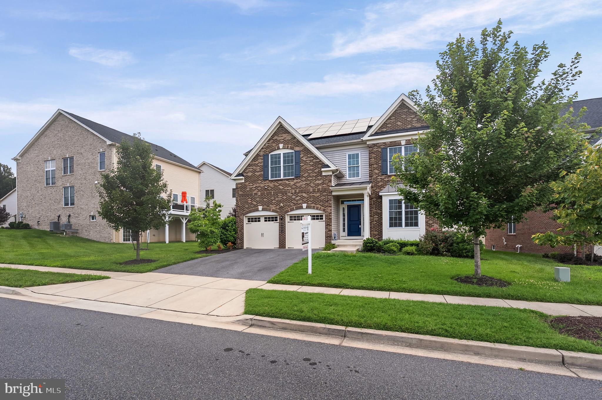 4603 Thoroughbred Drive Upper Marlboro, MD 20772 - Photo 2 of 64 a front view of house with yard and green space