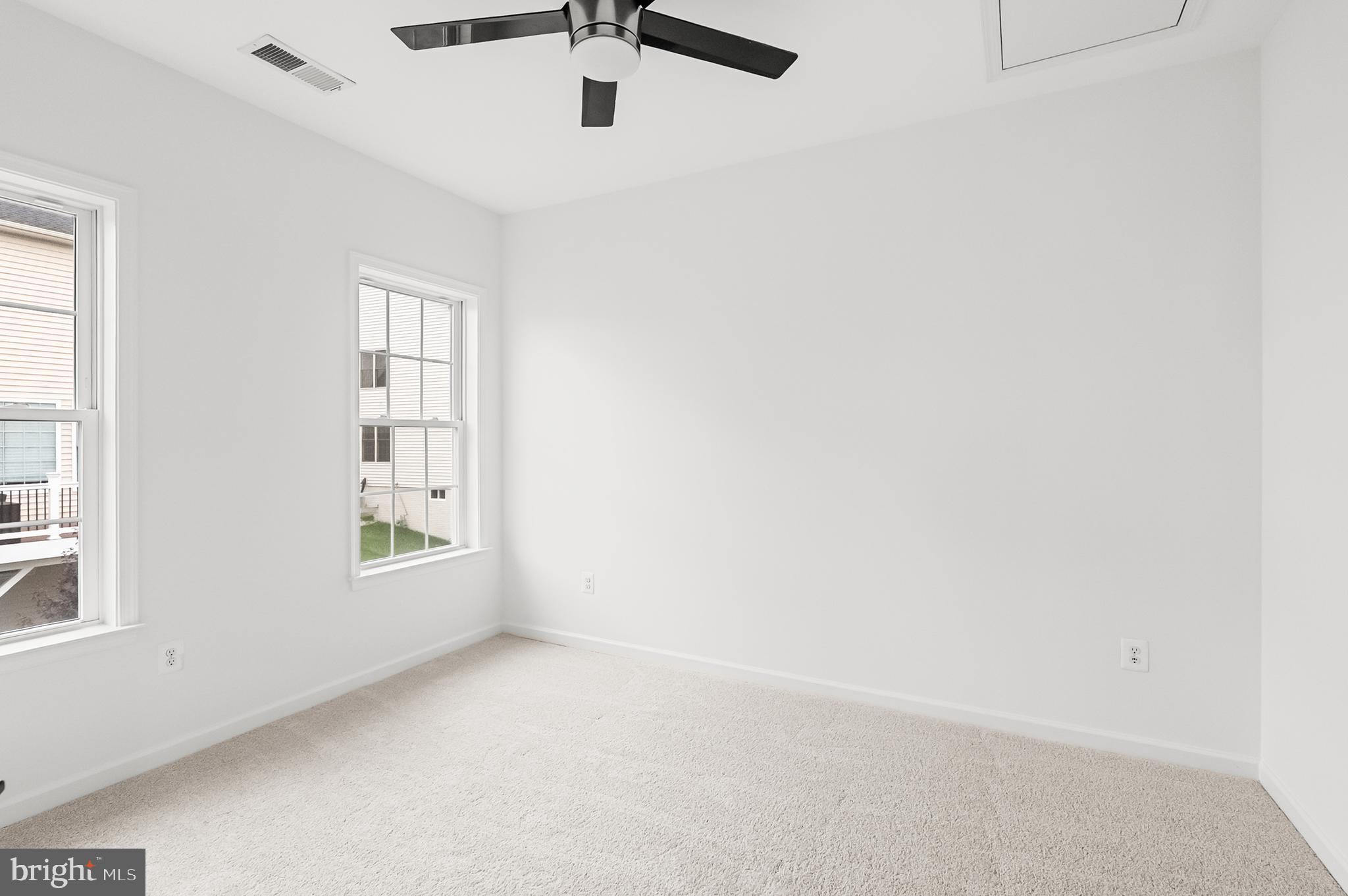 4603 Thoroughbred Drive Upper Marlboro, MD 20772 - Photo 28 of 64 an empty room with windows and fan