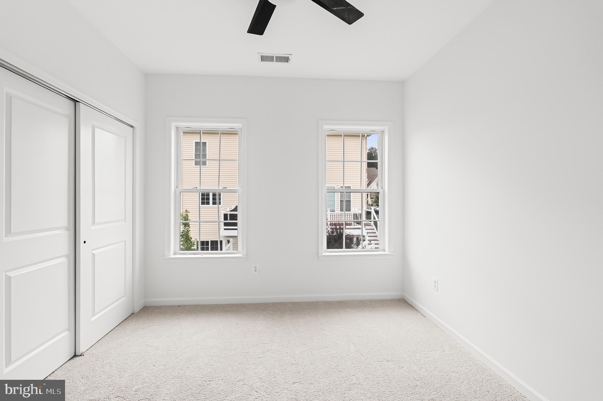 4603 Thoroughbred Drive Upper Marlboro, MD 20772 - Photo 29 of 64 an empty room with windows and closet