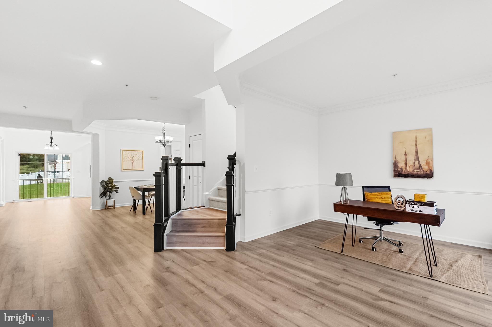 4603 Thoroughbred Drive Upper Marlboro, MD 20772 - Photo 4 of 64 a workspace with furniture and wooden floor