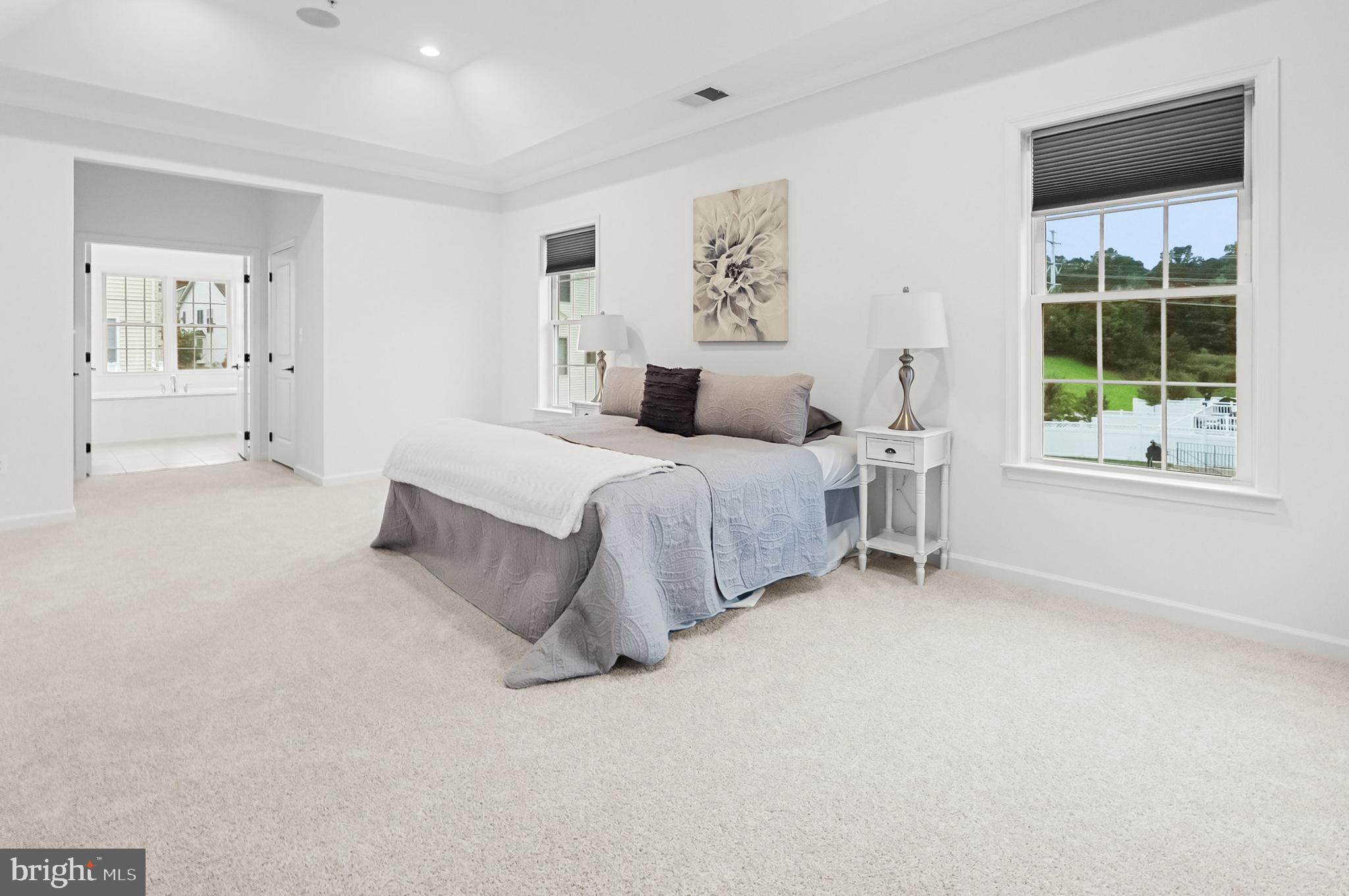 4603 Thoroughbred Drive Upper Marlboro, MD 20772 - Photo 43 of 64 a bedroom with a bed and a large window