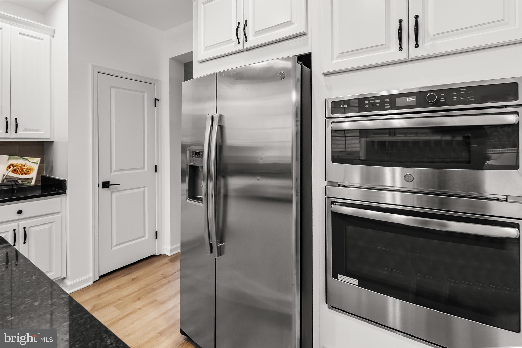 4603 Thoroughbred Drive Upper Marlboro, MD 20772 - Photo 59 of 64 a kitchen with cabinets and stainless steel appliances