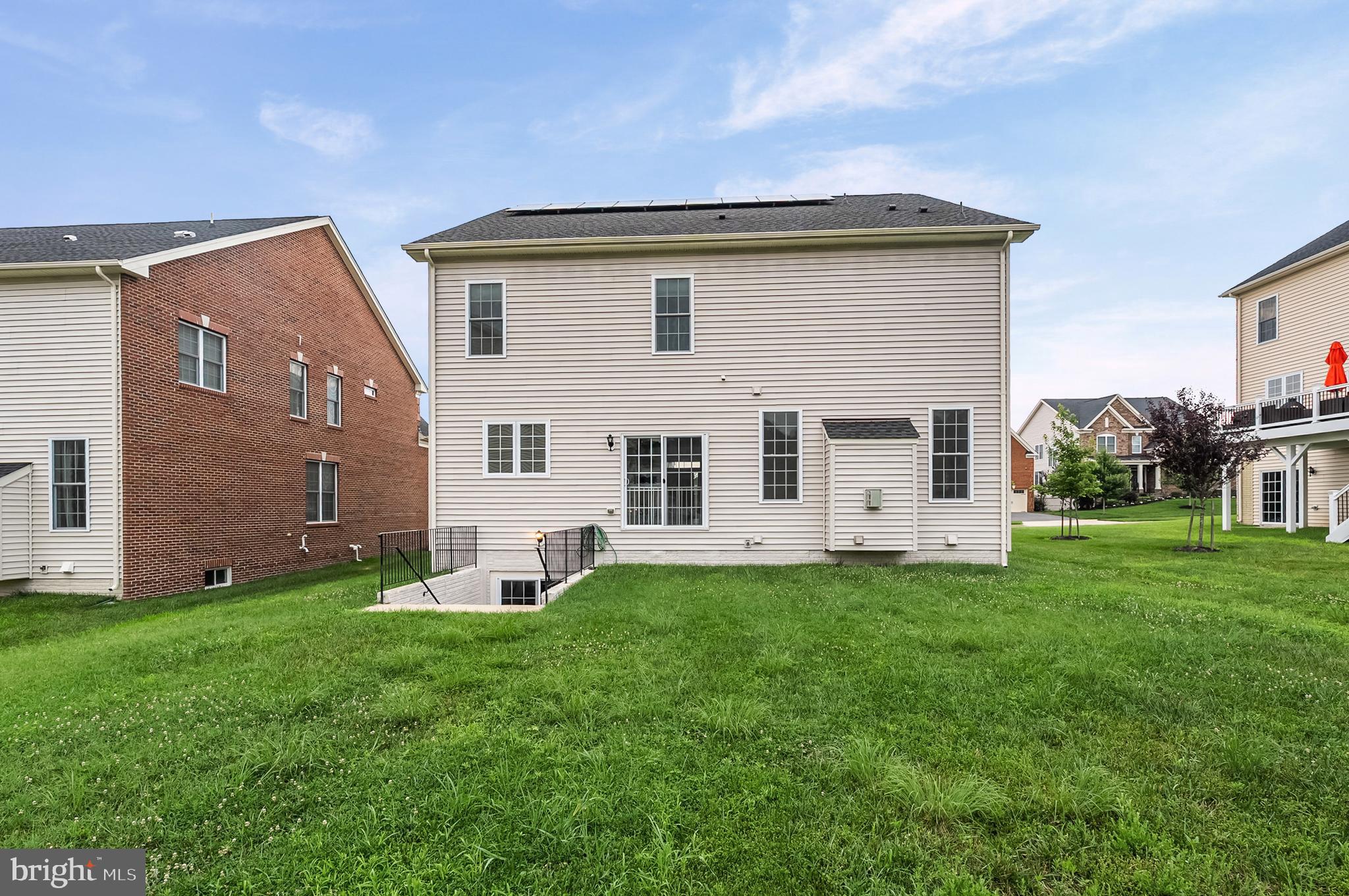 4603 Thoroughbred Drive Upper Marlboro, MD 20772 - Photo 61 of 64 a front view of a house with a yard