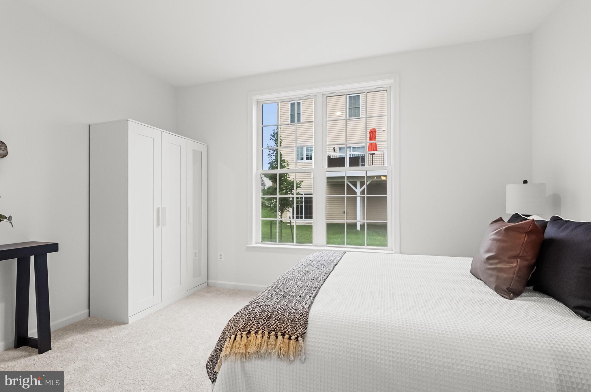 4603 Thoroughbred Drive Upper Marlboro, MD 20772 - Photo 9 of 64 a bedroom with a bed and a window