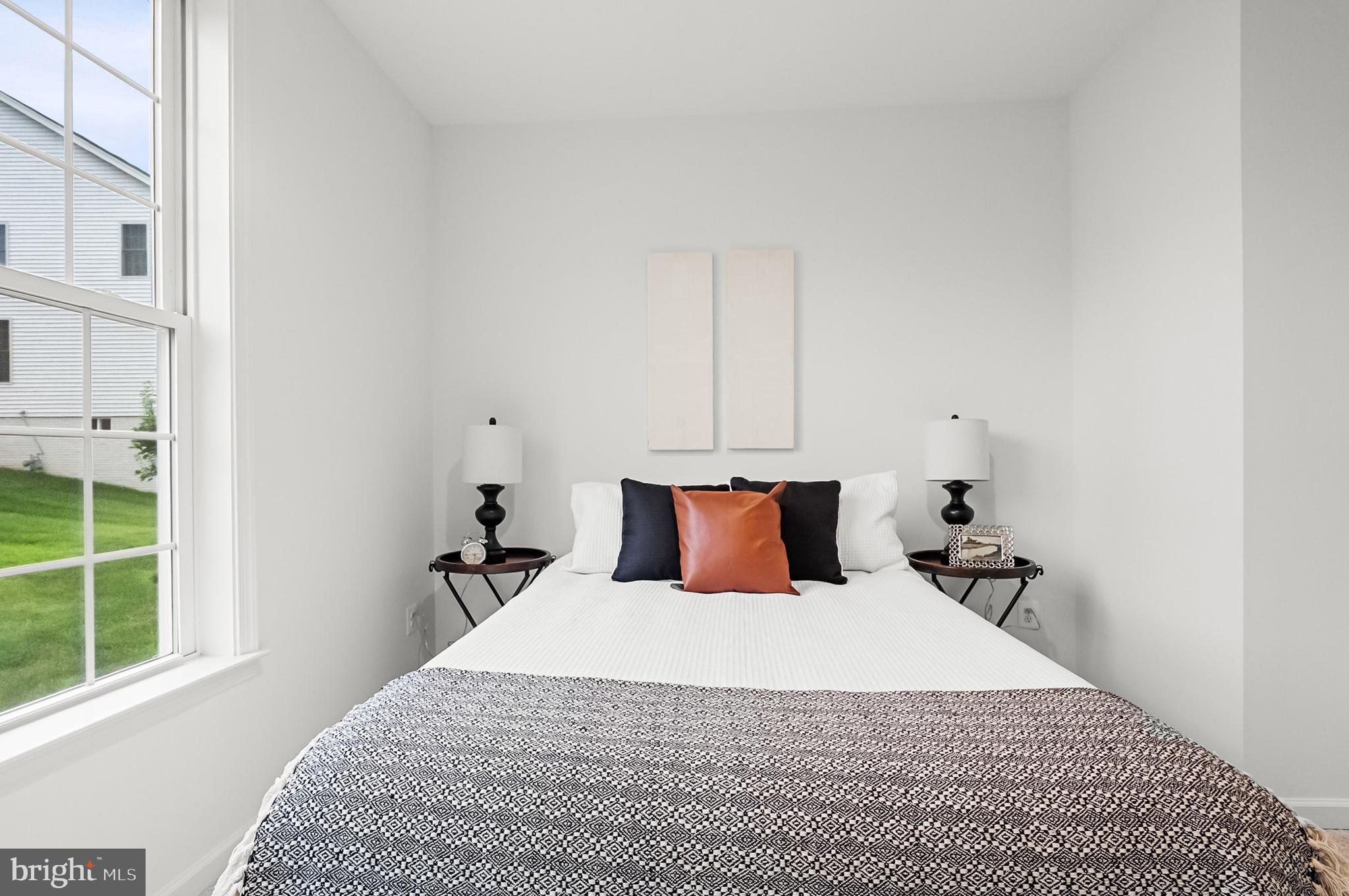 4603 Thoroughbred Drive Upper Marlboro, MD 20772 - Photo 10 of 64 a bedroom with a bed and window