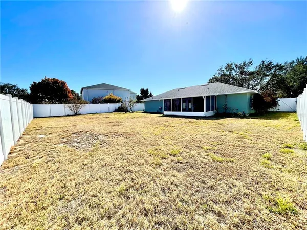a view of a swimming pool and an outdoor space