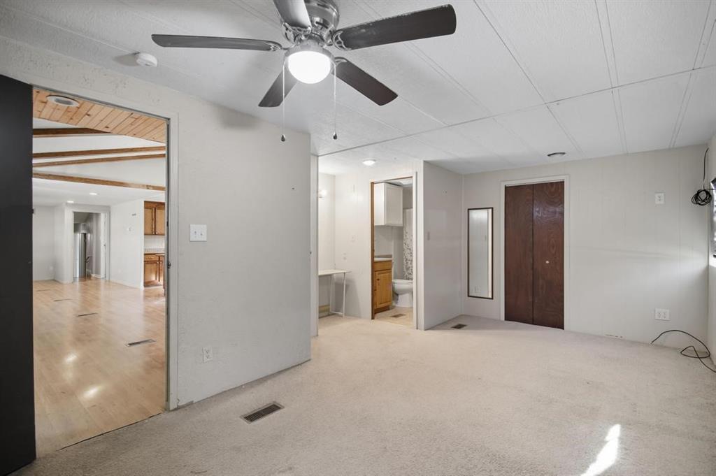 413 Charnel Street Clyde, TX 79510 - Photo 17 of 31 a view of a big room with closet and a ceiling fan