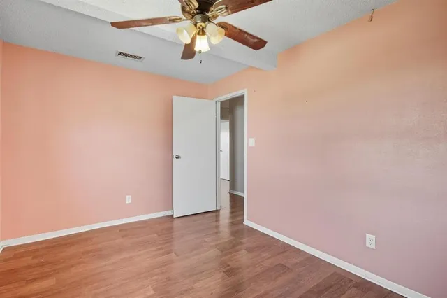 a view of yard with swimming pool and trees