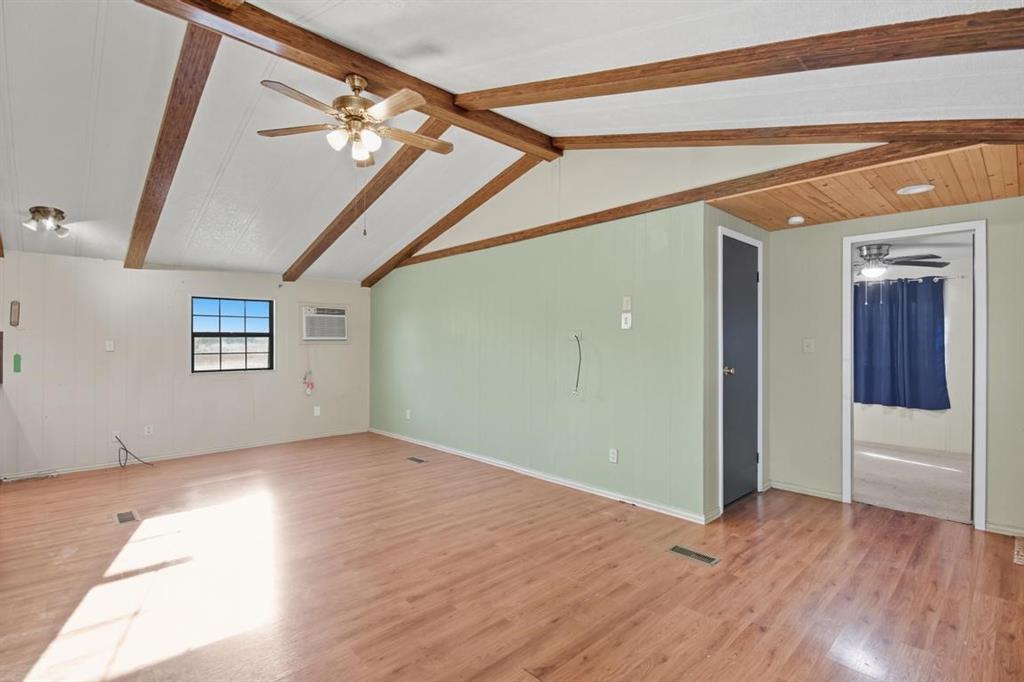 413 Charnel Street Clyde, TX 79510 - Photo 5 of 31 a view of empty room with wooden floor