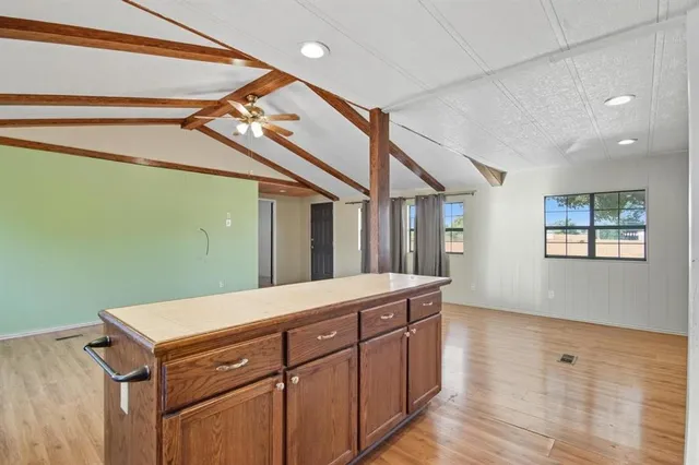 a room with a sink and a window