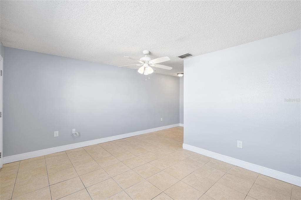 4930 Hazner Street New Port Richey, FL 34652 - Photo 5 of 22 an empty room with a window