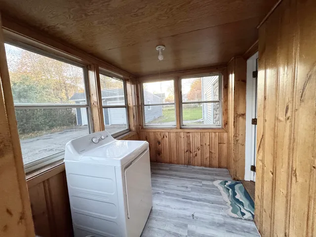 a bathroom with a sink and a large window