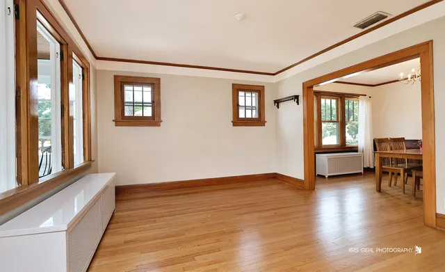 a view of livingroom with hardwood floor and a ceiling fan