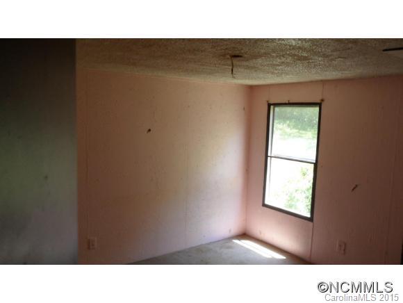 263 Inman Branch Road Waynesville, NC 28786 - Photo 7 of 10 a open kitchen with a window