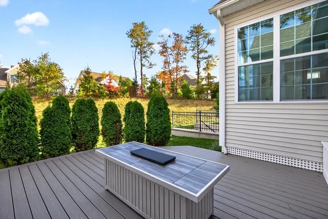 a view of a backyard with sitting area