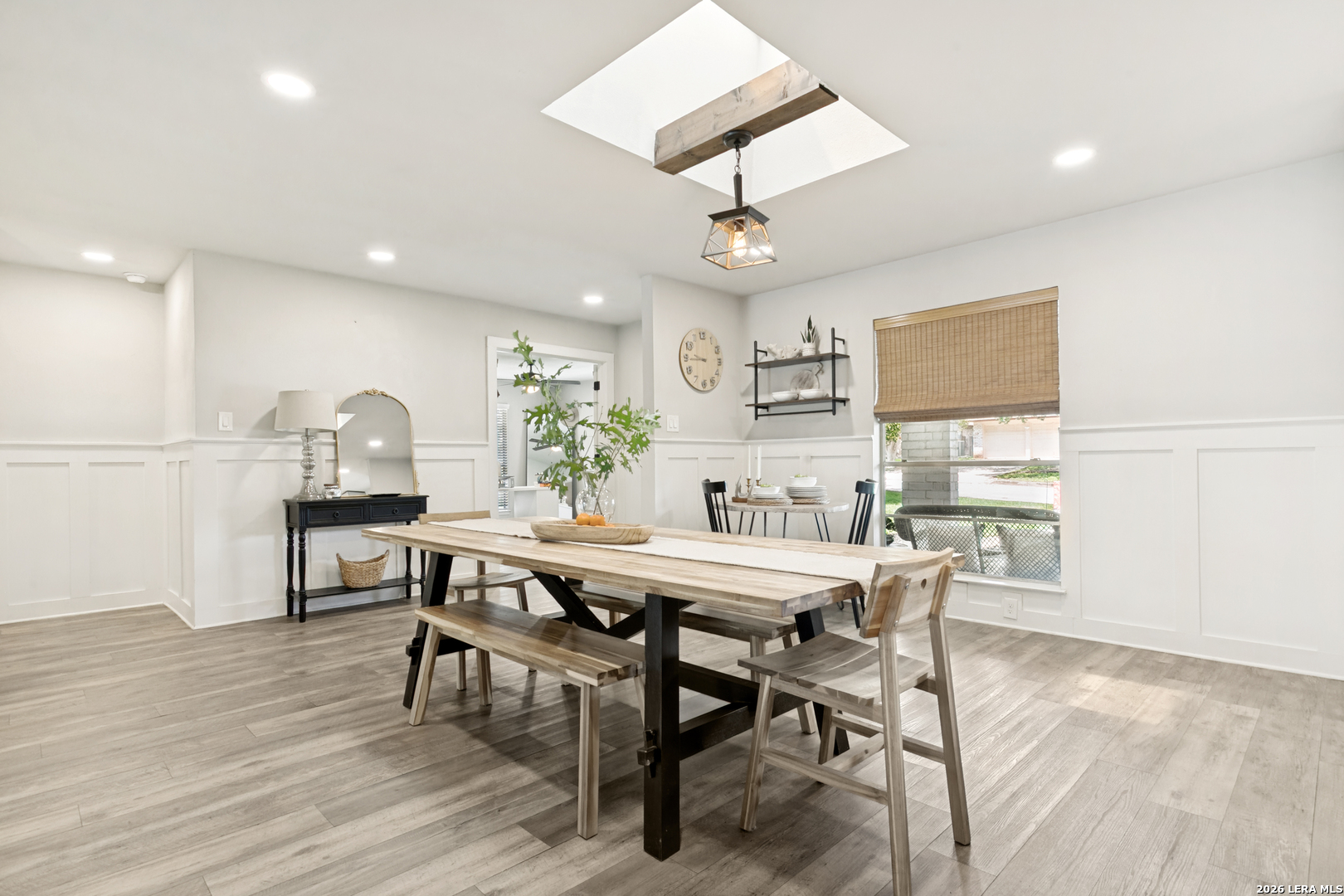 102 Silver Spring Universal City, TX 78148 - Photo 6 of 36 a view of a dining room with furniture and wooden floor
