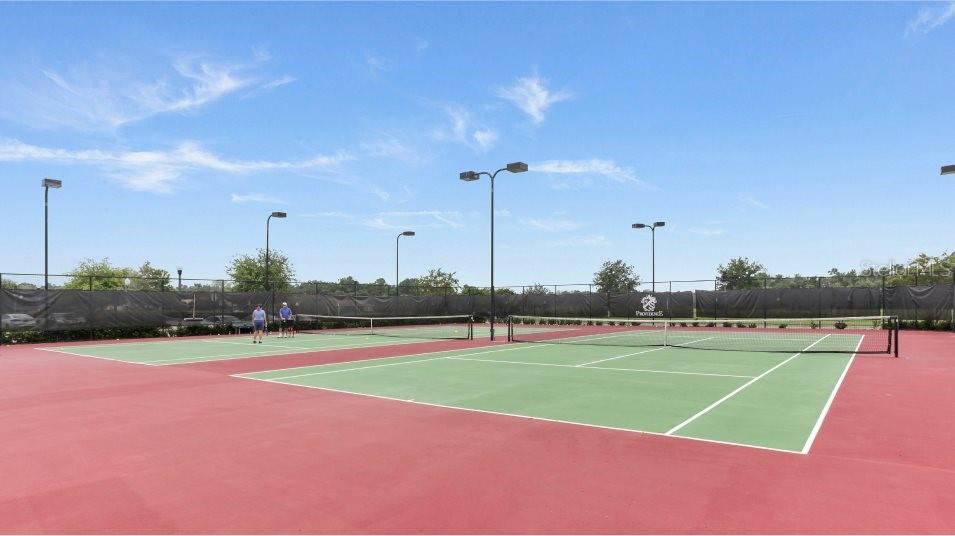 2653 Runners Circle Clermont, FL 34714 - Photo 7 of 13 a view of a tennis court