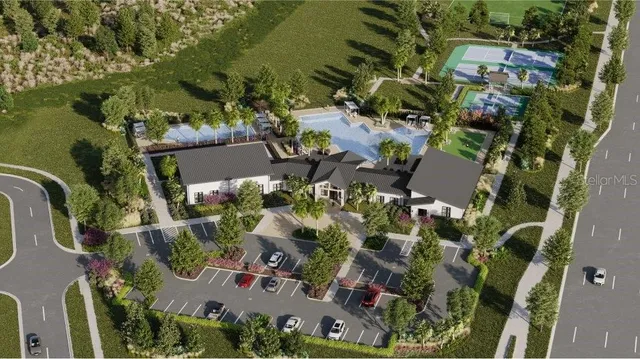 an aerial view of residential house with outdoor space and swimming pool
