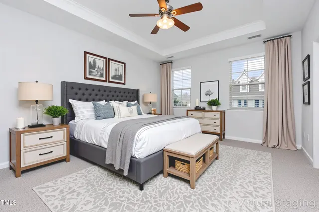 a bed room with a bed and a chandelier