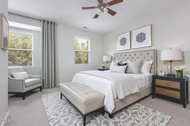 a bedroom with a bed and a couch