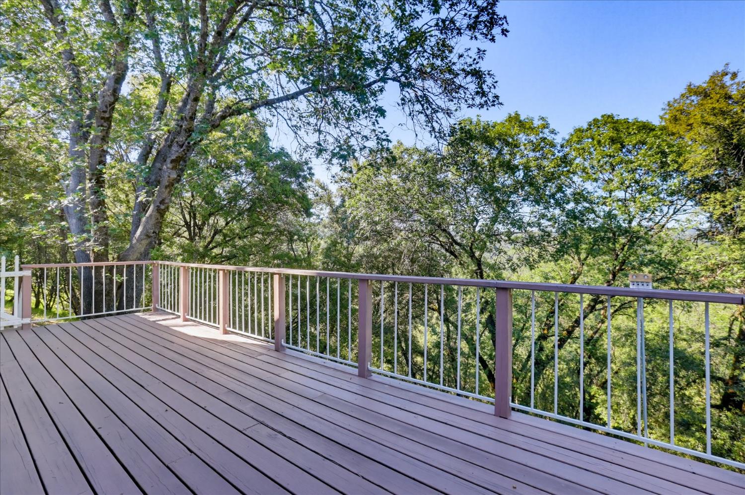 18639 Fay Ridge Court Grass Valley, CA 95949 - Photo 59 of 99 a balcony with wooden floor and fence