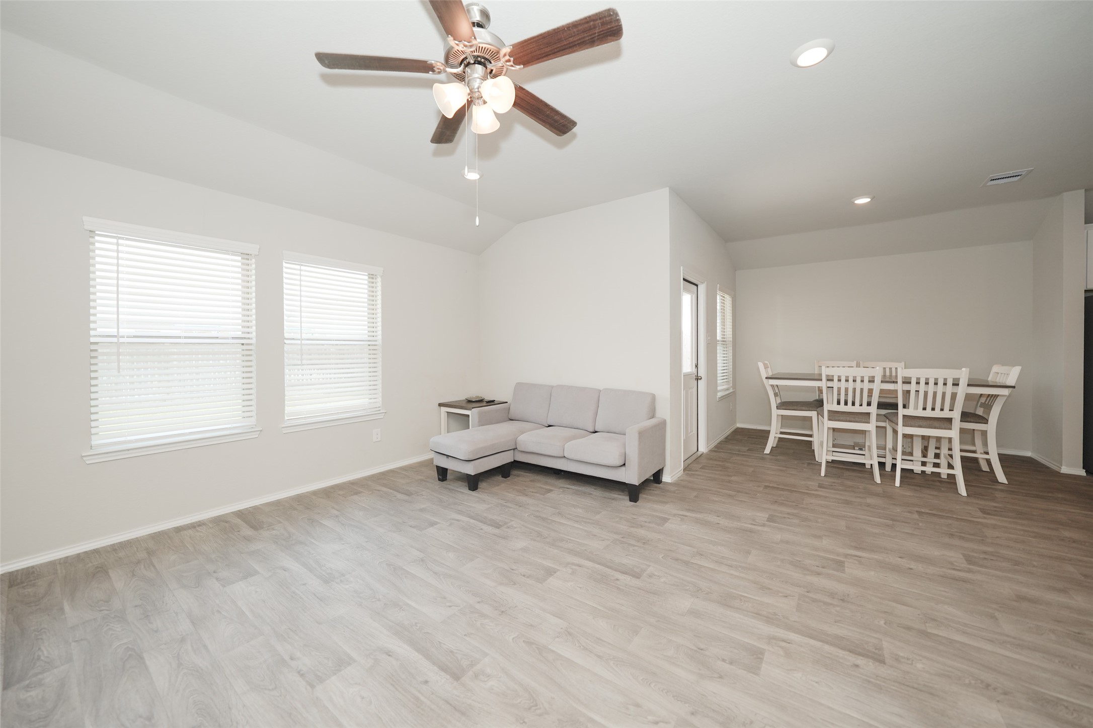 2407 Divot Lane Navasota, TX 77868 - Photo 20 of 37 a living room with furniture and a large window
