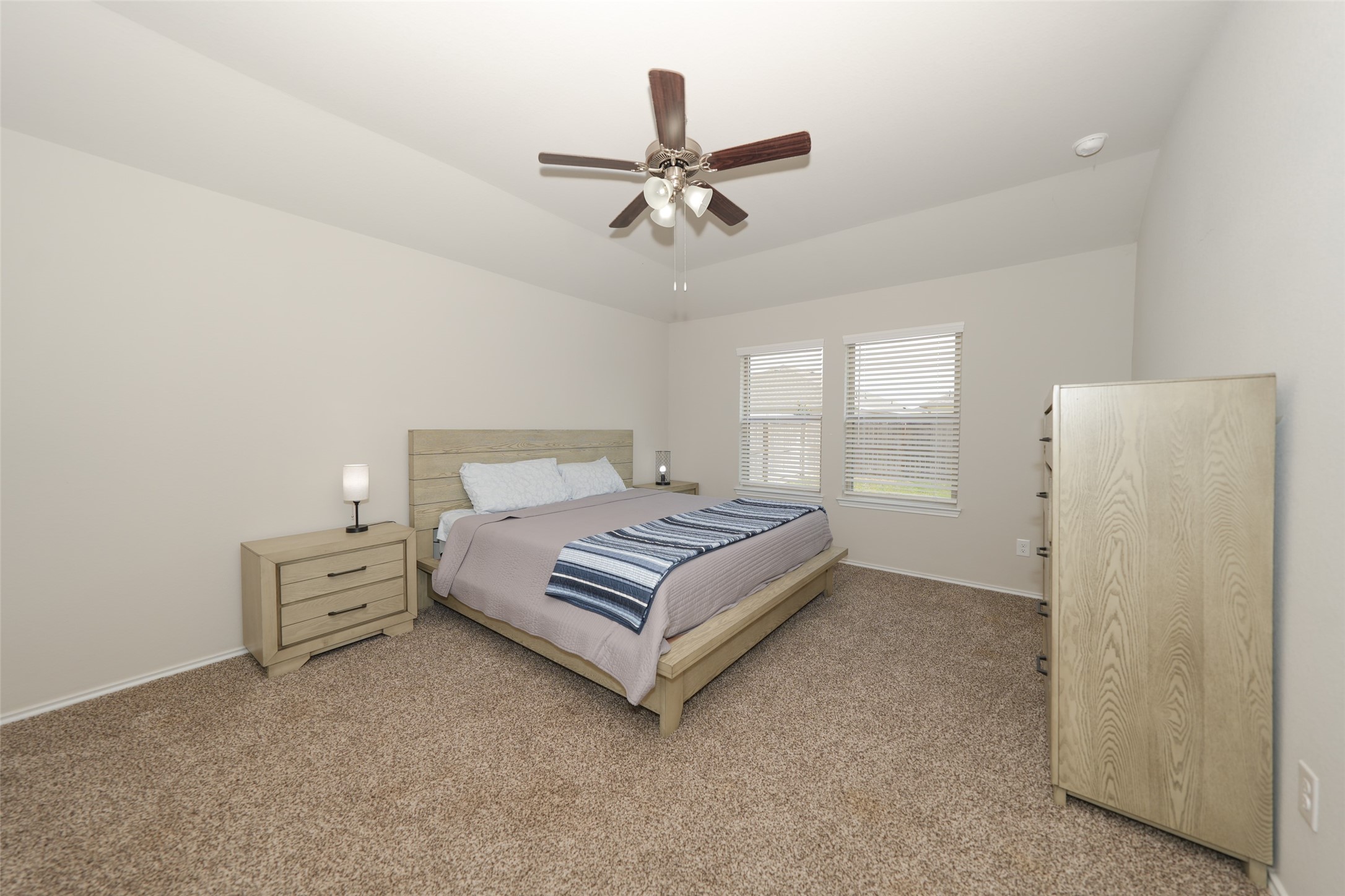 2407 Divot Lane Navasota, TX 77868 - Photo 31 of 37 a bedroom with a bed and window