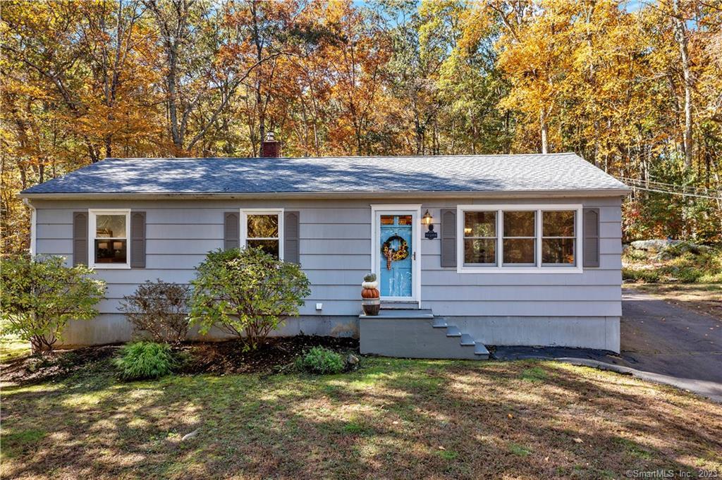 10 Lois Lane Guilford, CT 06437 - Photo 1 of 1 a house view with a garden space