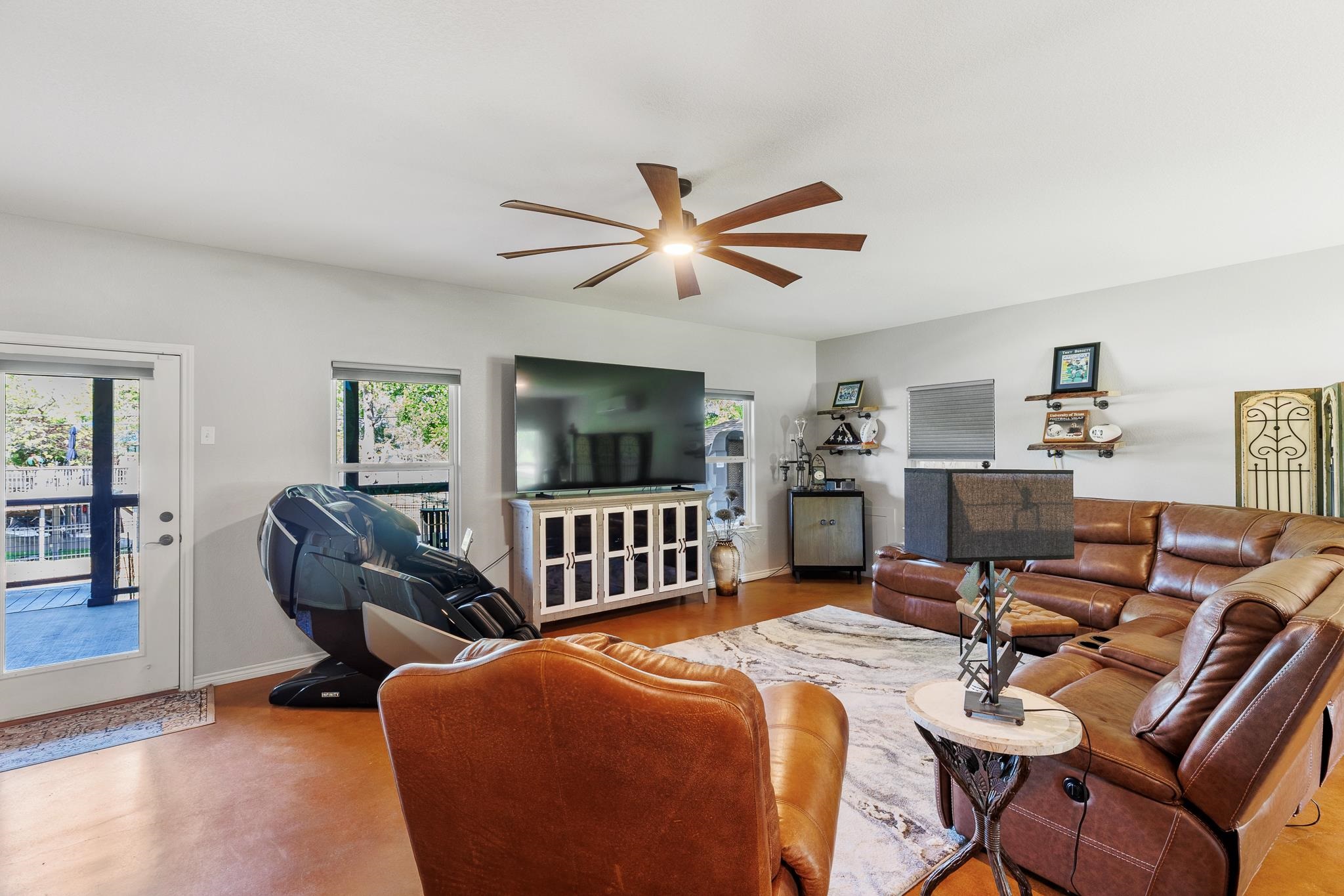 1633 Aztec Kingsland, TX 78639 - Photo 18 of 30 a bedroom with furniture and a chandelier fan