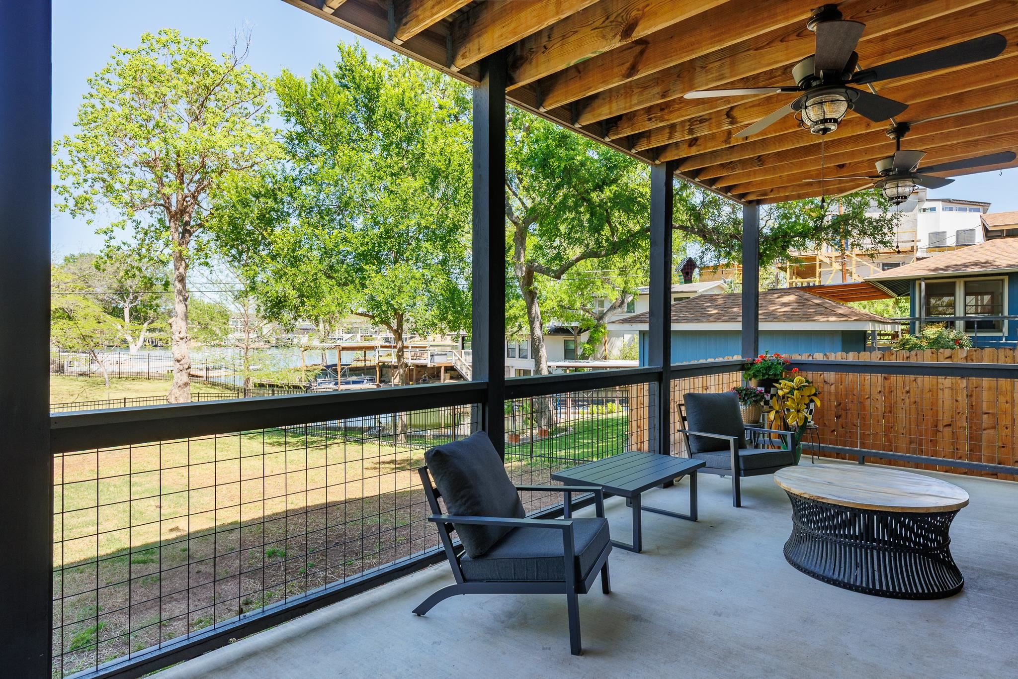 1633 Aztec Kingsland, TX 78639 - Photo 22 of 30 a balcony with furniture and a potted plant