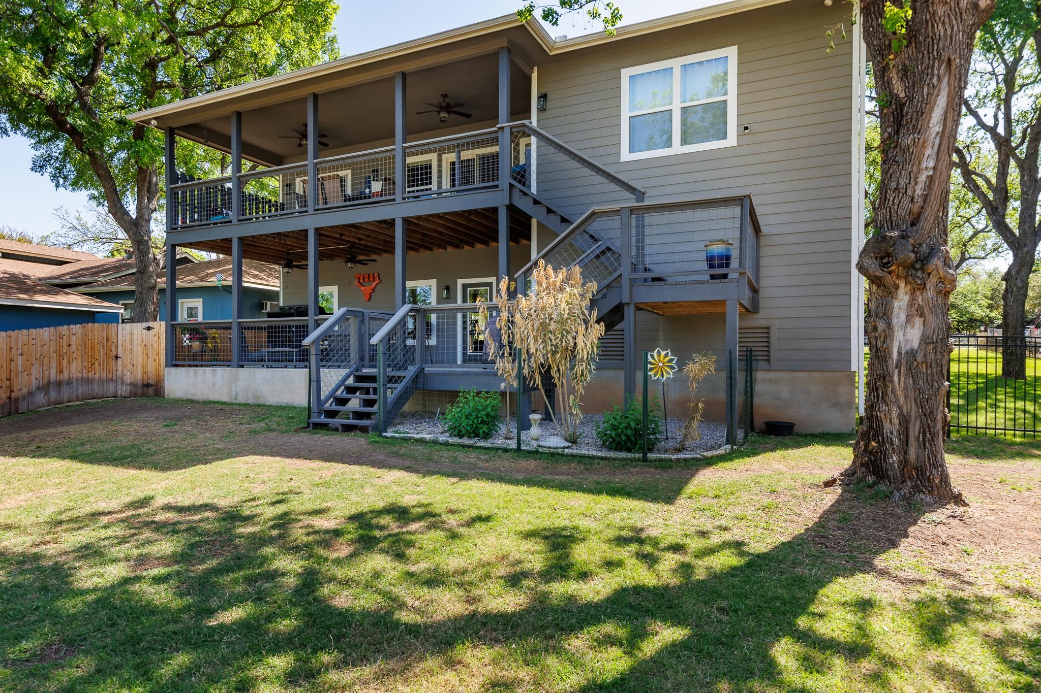 1633 Aztec Kingsland, TX 78639 - Photo 24 of 30 a view of a house with yard and sitting area