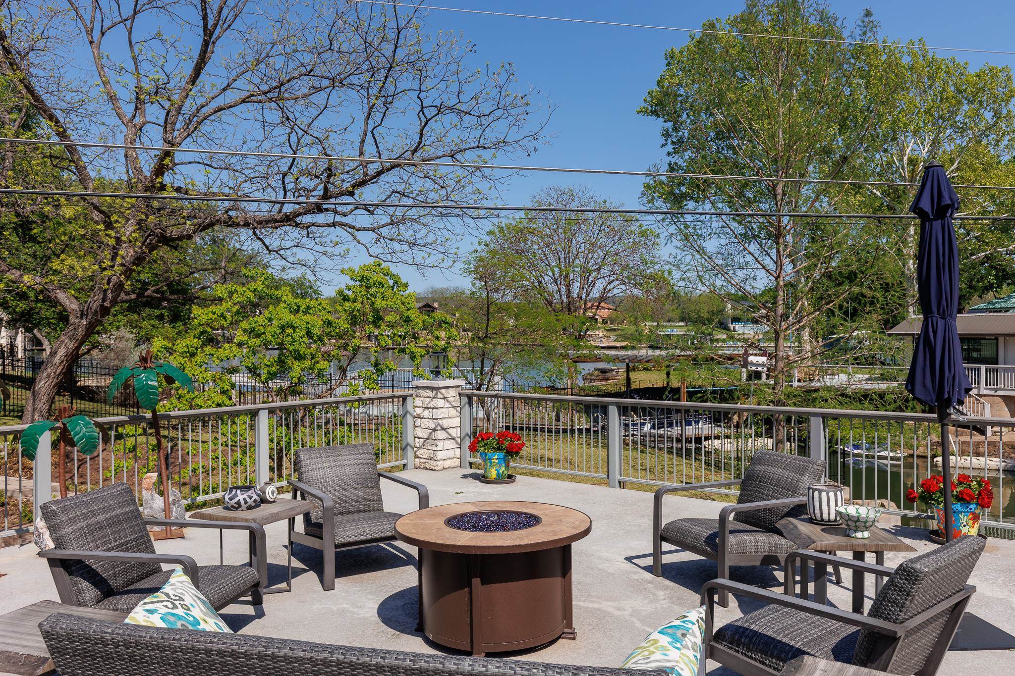 1633 Aztec Kingsland, TX 78639 - Photo 26 of 30 a view of a patio with couches chairs and a potted plant
