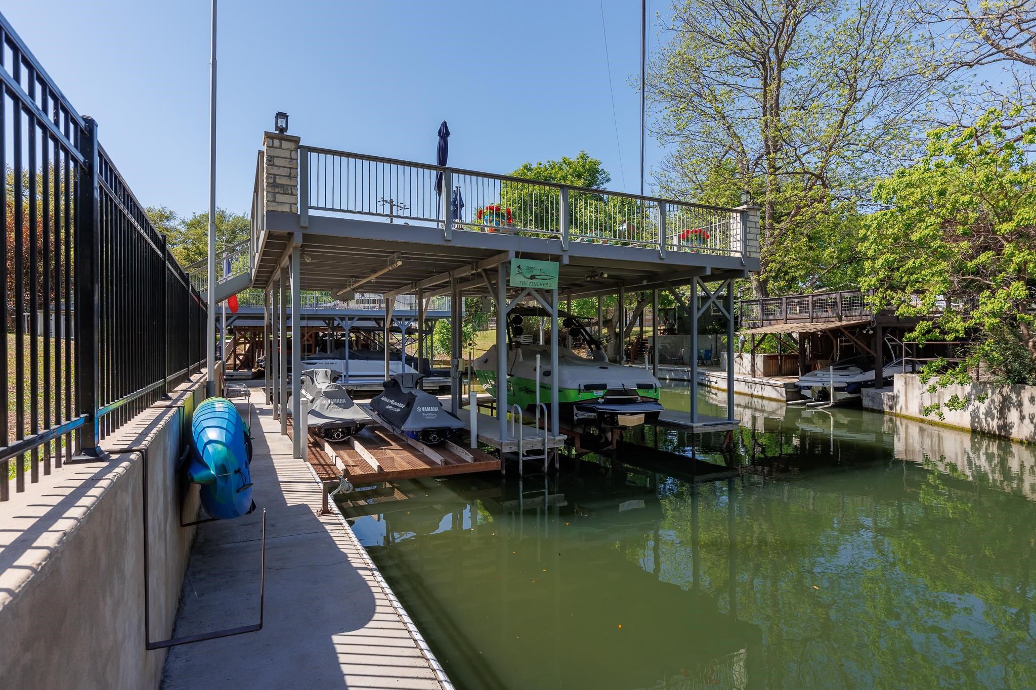 1633 Aztec Kingsland, TX 78639 - Photo 28 of 30 a view of water with a dinning table and chairs in the patio
