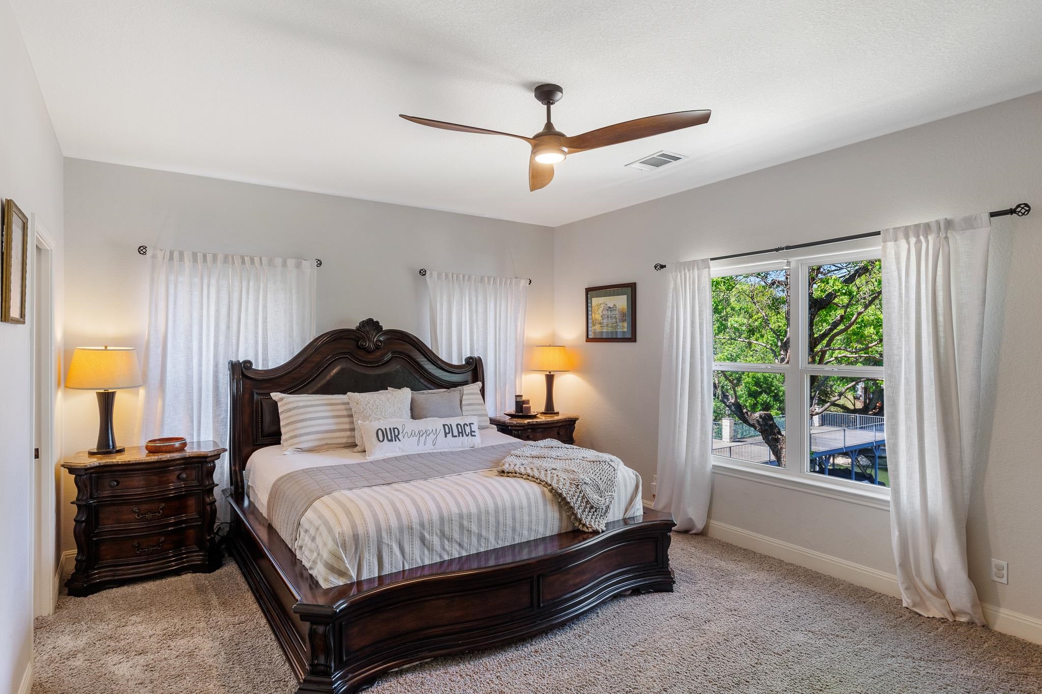 1633 Aztec Kingsland, TX 78639 - Photo 9 of 30 a bedroom with a bed and a window