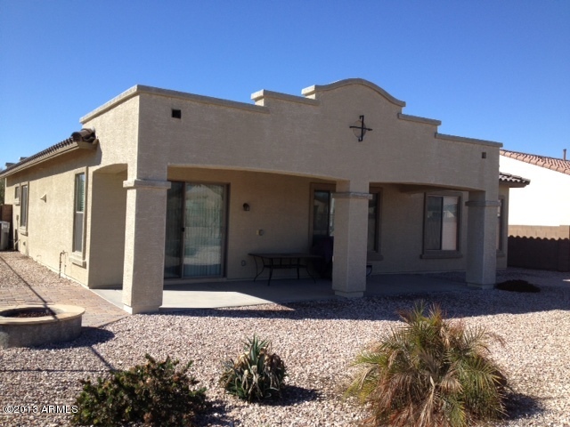 17902 West Verdin Road Goodyear, AZ 85338 - Photo 7 of 10 a front view of a house with a yard