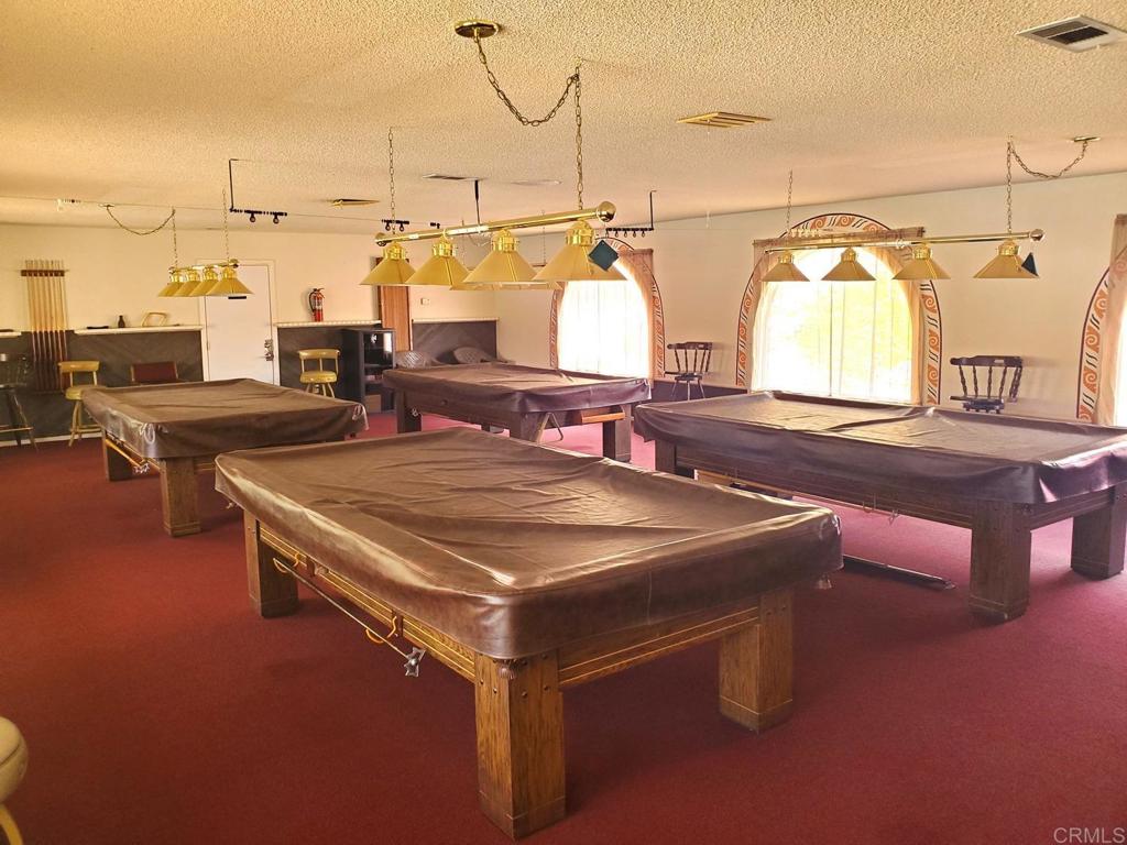 909 Richland Road, Unit 52 San Marcos, CA 92069 - Photo 17 of 28 a room with pool table and window