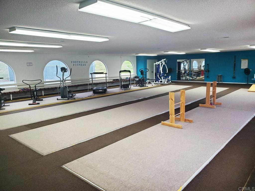 909 Richland Road, Unit 52 San Marcos, CA 92069 - Photo 22 of 28 a kitchen with counter top space and living room