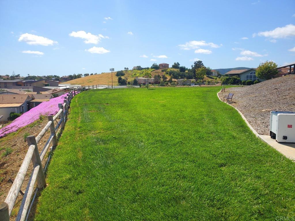 909 Richland Road, Unit 52 San Marcos, CA 92069 - Photo 24 of 28 a view of an outdoor space and deck