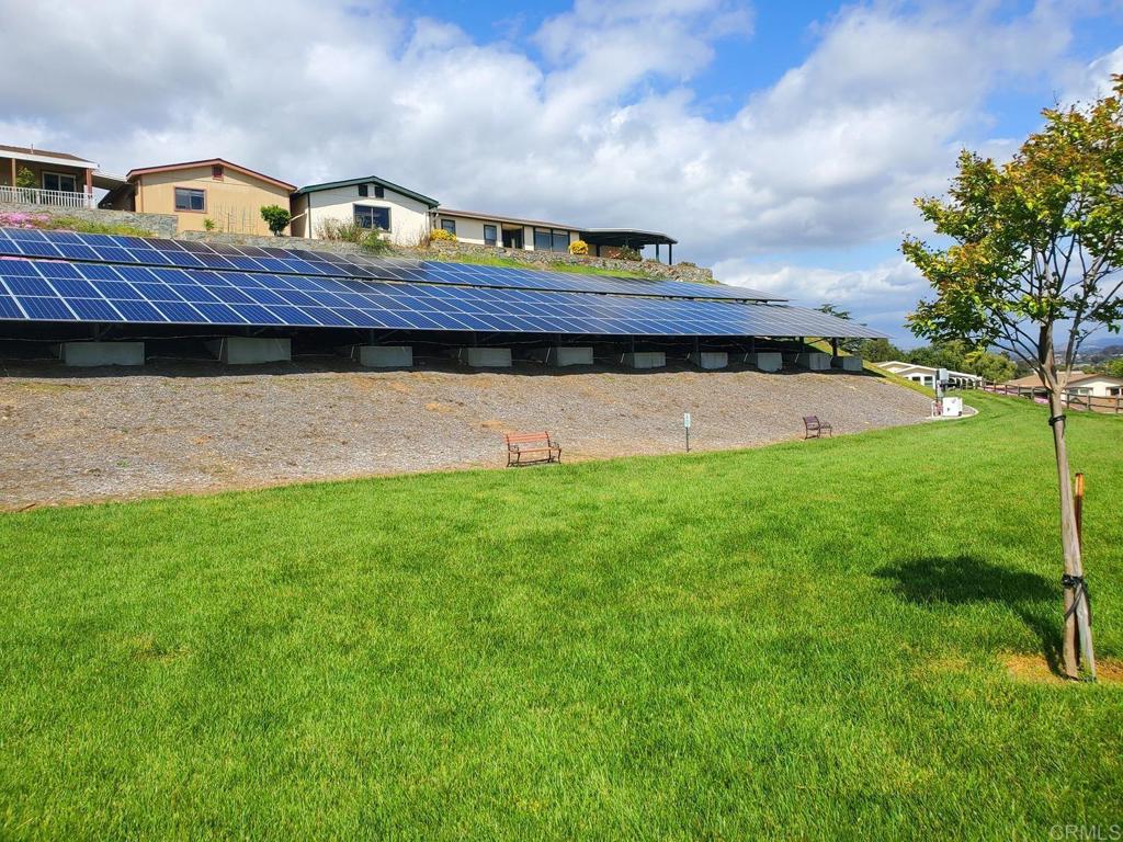 909 Richland Road, Unit 52 San Marcos, CA 92069 - Photo 26 of 28 a view of a big yard with an outdoor seating
