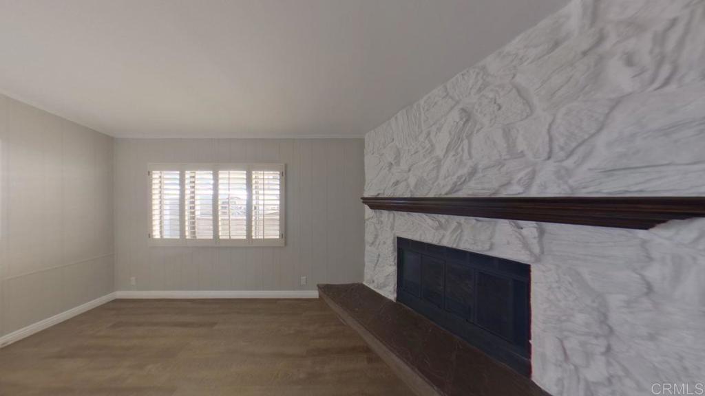 909 Richland Road, Unit 52 San Marcos, CA 92069 - Photo 5 of 28 an empty room with windows