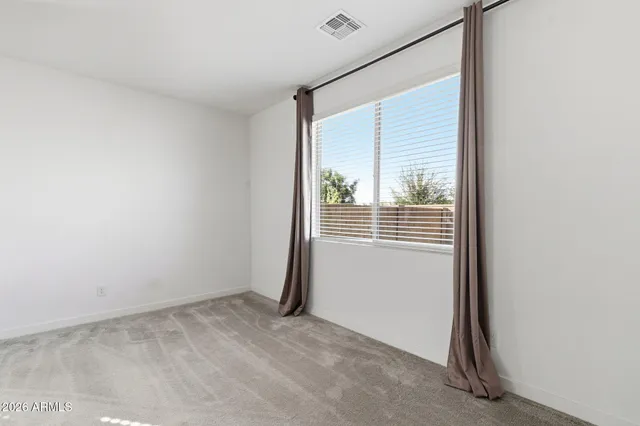 a view of a room with a window