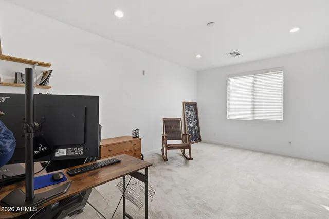 a room with furniture and a flat screen tv
