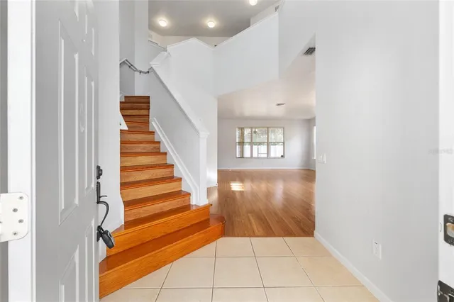 a view of an entryway with staircase