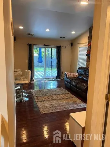 a bathroom with a sink a mirror and shower