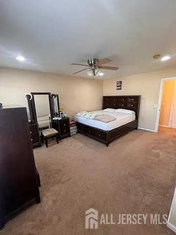 an entryway with wooden floor