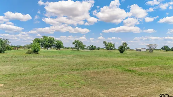 a view of yard with an outdoor space
