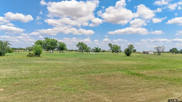 a view of yard with an outdoor space