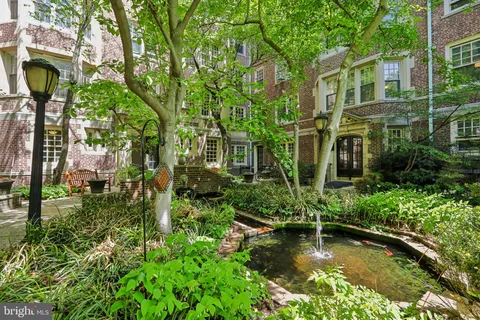 a view of a garden with a fountain